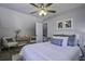Spacious bedroom with a king bed and two armchairs at 117 Hummingbird Ave, Ladson, SC 29456