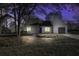 Updated gray house exterior at night, nicely lit at 117 Hummingbird Ave, Ladson, SC 29456