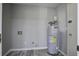 Small laundry room with a new water heater at 117 Hummingbird Ave, Ladson, SC 29456