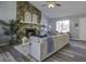 Living room with a cozy stone fireplace and hardwood floor at 117 Hummingbird Ave, Ladson, SC 29456
