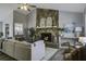 Spacious living room with stone fireplace and vaulted ceiling at 117 Hummingbird Ave, Ladson, SC 29456
