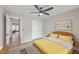 Bedroom with a queen-size bed and yellow bedding, near another room at 1202 Waterwood Dr, Goose Creek, SC 29445