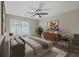 Bright bedroom with a king-size bed and access to a private patio at 1202 Waterwood Dr, Goose Creek, SC 29445