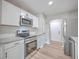 Modern kitchen with stainless steel appliances and granite countertops at 1202 Waterwood Dr, Goose Creek, SC 29445