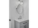 Small bathroom with vanity and oval mirror at 138 Green Pond Hwy, Walterboro, SC 29488