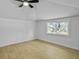 Bright bedroom with hardwood floors and large window at 138 Green Pond Hwy, Walterboro, SC 29488