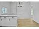Open dining area adjacent to kitchen with light wood flooring at 138 Green Pond Hwy, Walterboro, SC 29488