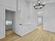 Open dining room with hardwood floors and access to other rooms at 138 Green Pond Hwy, Walterboro, SC 29488