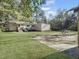 House exterior showcasing a large backyard and driveway at 138 Green Pond Hwy, Walterboro, SC 29488