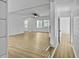 Open living room with hardwood floors and access to other rooms at 138 Green Pond Hwy, Walterboro, SC 29488