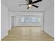 Bright living room with hardwood floors and ceiling fan at 138 Green Pond Hwy, Walterboro, SC 29488