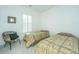 Bedroom with two twin beds and a wicker chair at 1395 Tollison Path, Mount Pleasant, SC 29466