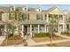 Brick townhome with a front porch and landscaped yard at 1395 Tollison Path, Mount Pleasant, SC 29466