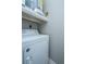 Laundry closet with dryer and shelving at 1600 Long Grove Dr # 1422, Mount Pleasant, SC 29464