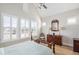 Main bedroom with hardwood floors, plantation shutters and a lovely water view at 1659 Adventure Xing, Mount Pleasant, SC 29466