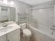 White bathroom with bathtub, toilet, and vanity at 1664 Bridwell Ln, Mount Pleasant, SC 29466