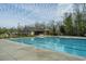 Community swimming pool with surrounding deck at 168 Pavilion St, Summerville, SC 29483