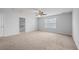 Large bedroom with carpet, walk-in closet, and window at 187 Weeping Cypress Dr, Moncks Corner, SC 29461