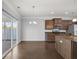 Kitchen dining area with hardwood floors and sliding glass door at 187 Weeping Cypress Dr, Moncks Corner, SC 29461