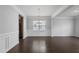 Formal dining room with hardwood floors and neutral wall colors at 187 Weeping Cypress Dr, Moncks Corner, SC 29461