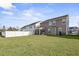 Gray house exterior with large backyard and screened porch at 187 Weeping Cypress Dr, Moncks Corner, SC 29461