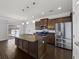 Modern kitchen with stainless steel appliances and granite countertops at 187 Weeping Cypress Dr, Moncks Corner, SC 29461