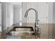 Stainless steel sink with modern faucet in granite countertop at 187 Weeping Cypress Dr, Moncks Corner, SC 29461