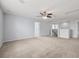 Spacious loft area with carpet and ceiling fan at 187 Weeping Cypress Dr, Moncks Corner, SC 29461
