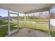 Spacious screened porch overlooking backyard and pond at 187 Weeping Cypress Dr, Moncks Corner, SC 29461