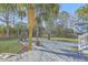 Back deck with gray wood and surrounding yard at 1915 Hall Point Rd, Mount Pleasant, SC 29466