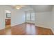 Bedroom with hardwood floors and adjacent bathroom at 1915 Hall Point Rd, Mount Pleasant, SC 29466