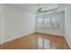 Bright bedroom with hardwood floors and ceiling fan at 1915 Hall Point Rd, Mount Pleasant, SC 29466