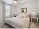 Spacious bedroom with a king-size bed and neutral decor at 203 Abercom Place Dr, Moncks Corner, SC 29461