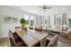Open concept dining area with hardwood floors and living room view at 203 Abercom Place Dr, Moncks Corner, SC 29461