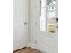 Modern white front door with glass panels at 203 Abercom Place Dr, Moncks Corner, SC 29461