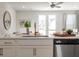 Kitchen with island, stainless steel appliances, and access to backyard at 203 Abercom Place Dr, Moncks Corner, SC 29461