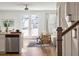Spacious living room with French doors leading to backyard at 203 Abercom Place Dr, Moncks Corner, SC 29461