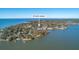 Aerial view shows 208 Catfish Landing Cir located on a waterfront lot with nearby homes and water access at 208 Catfish Landing Cir, Bonneau, SC 29431