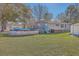 Large backyard with above ground pool and storage shed at 208 Catfish Landing Cir, Bonneau, SC 29431
