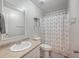 Small bathroom with a single sink, toilet and shower at 208 Catfish Landing Cir, Bonneau, SC 29431