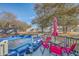 Small deck with table and chairs overlooking above ground pool at 208 Catfish Landing Cir, Bonneau, SC 29431