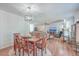 Dining area with view into living room and kitchen at 208 Catfish Landing Cir, Bonneau, SC 29431