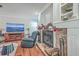 Stone fireplace with mantel and built-in shelving at 208 Catfish Landing Cir, Bonneau, SC 29431