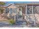 House front entry with steps leading to a screened porch at 208 Catfish Landing Cir, Bonneau, SC 29431