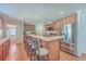Modern kitchen with stainless steel appliances and breakfast bar at 208 Catfish Landing Cir, Bonneau, SC 29431