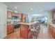 Stainless steel appliances and breakfast bar in open concept kitchen at 208 Catfish Landing Cir, Bonneau, SC 29431