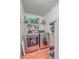 Laundry room with washer, dryer, and shelving at 208 Catfish Landing Cir, Bonneau, SC 29431