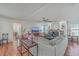 Spacious living room with a fireplace, sectional sofa, and large TV at 208 Catfish Landing Cir, Bonneau, SC 29431
