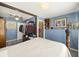 Cozy bedroom with mirrored closet and blue walls at 2108 Ridge Church Rd # A & B, Summerville, SC 29486