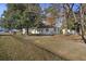House front view, with yard and trees at 2108 Ridge Church Rd # A & B, Summerville, SC 29486